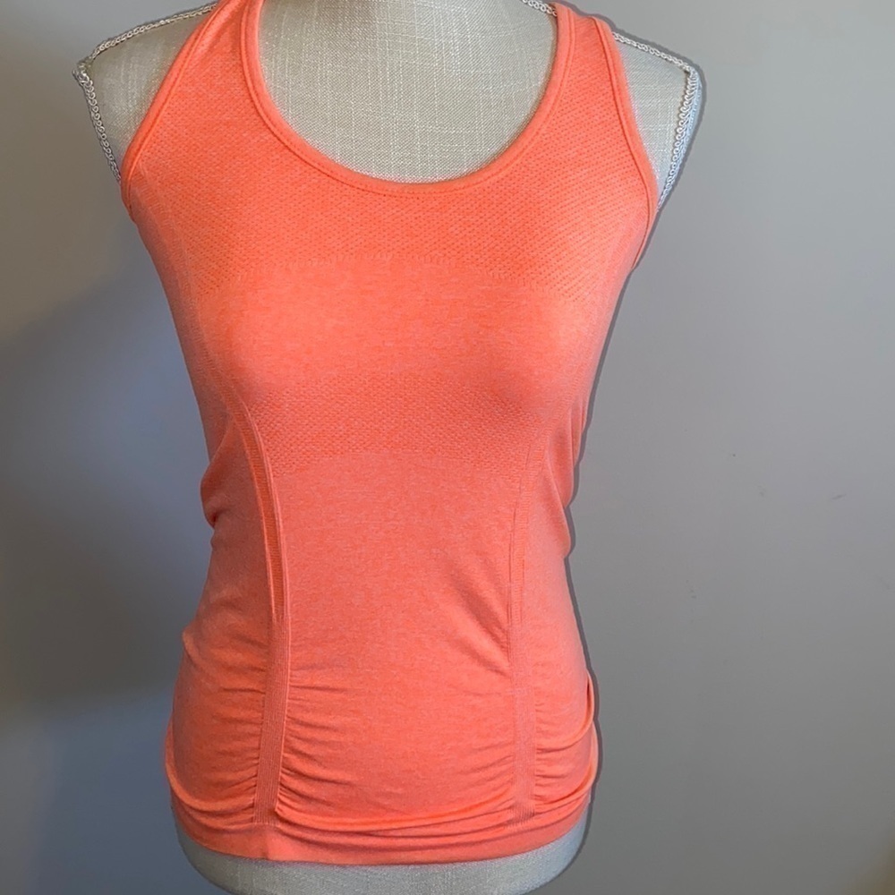 Athleta T back tank orange in color size extra small